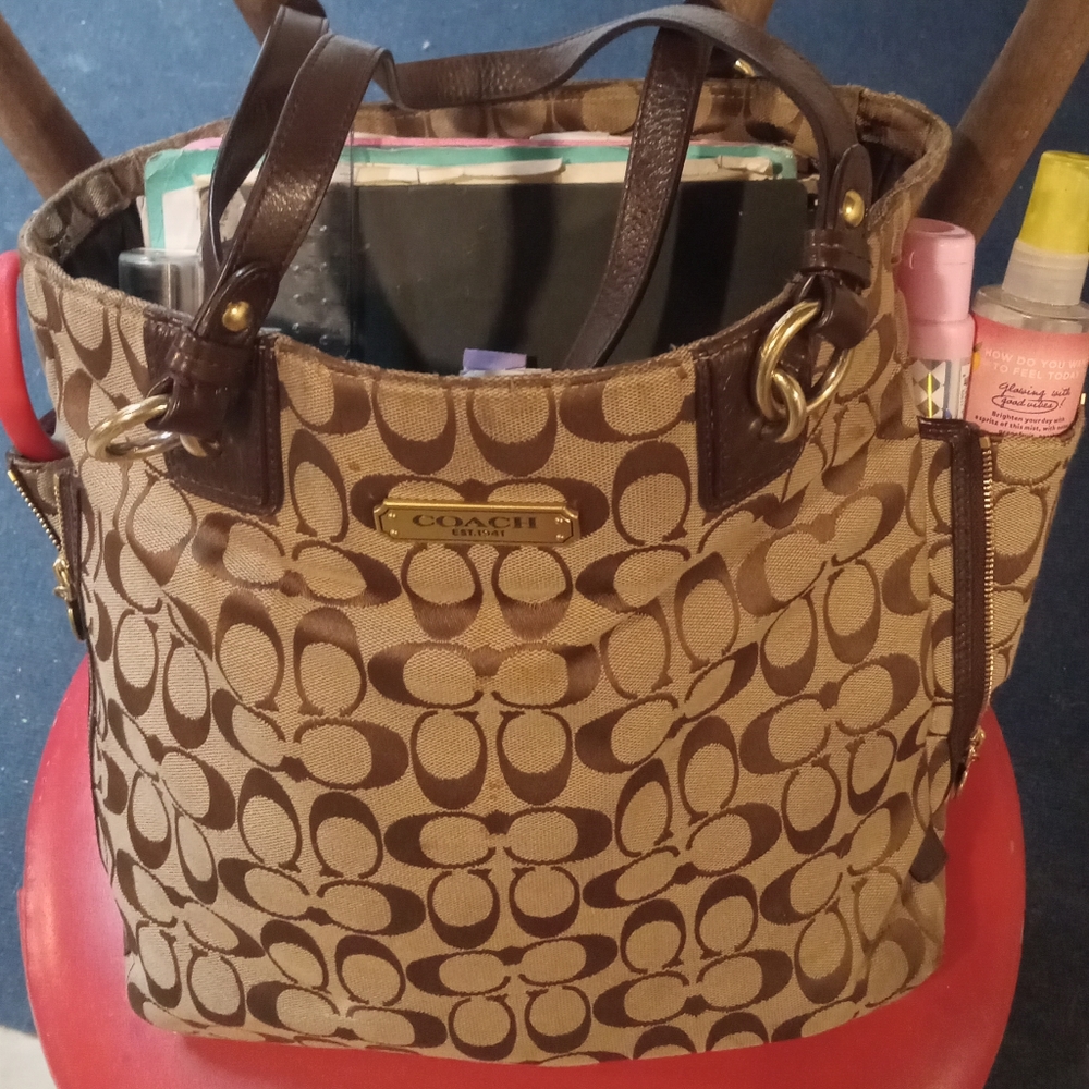 Coach signature zipper